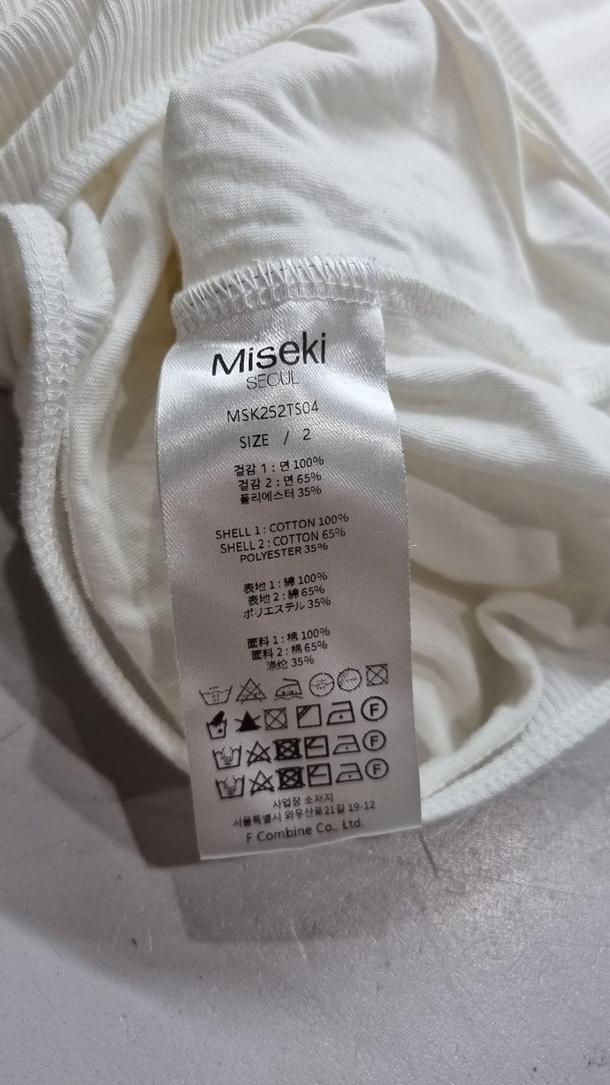 미세키서울(MISEKI SEOUL) String layered knit top 2