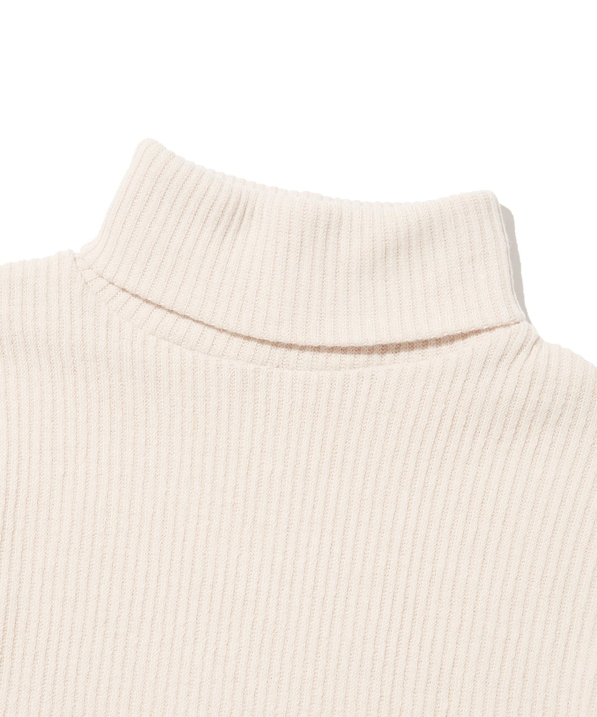 서울어패럴(SEOUL APPAREL) 커브드 헴 워머 목폴라 레이어드 (아이보리)