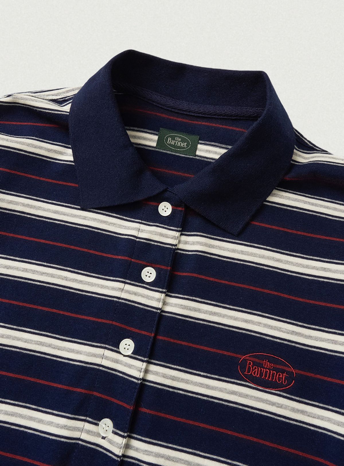 더바넷(THEBARNNET) Lang Stripe Polo Top_Navy