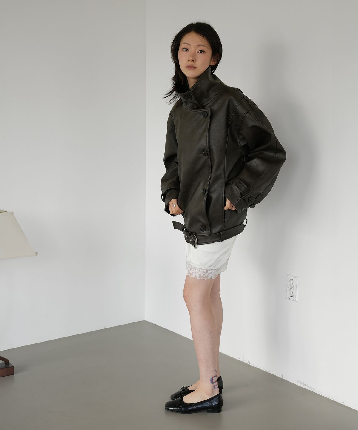 포트레이트서울(PORTRAITSEOUL) 오버사이즈 하이넥 레더 자켓 - 브라운