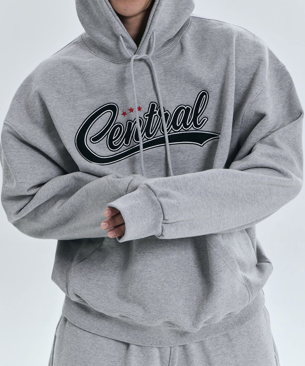더랭크(THERANK) CENTRAL LEATHER APPLIQUE HOODIE [MELANGE GREY]