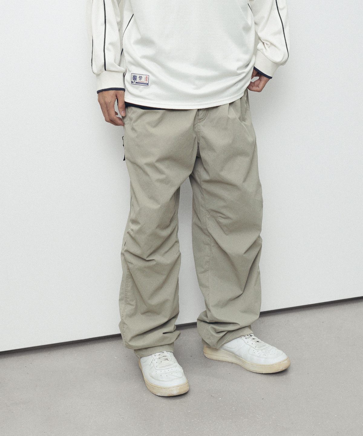 디스이즈네버댓(THISISNEVERTHAT) Wind Pant Stone