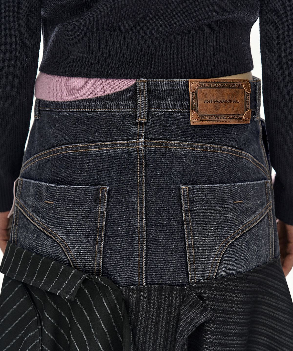 앤더슨벨(ADSB ANDERSSON BELL) REWORKED DENIM PANEL WRAP SKIRT (BLACK)