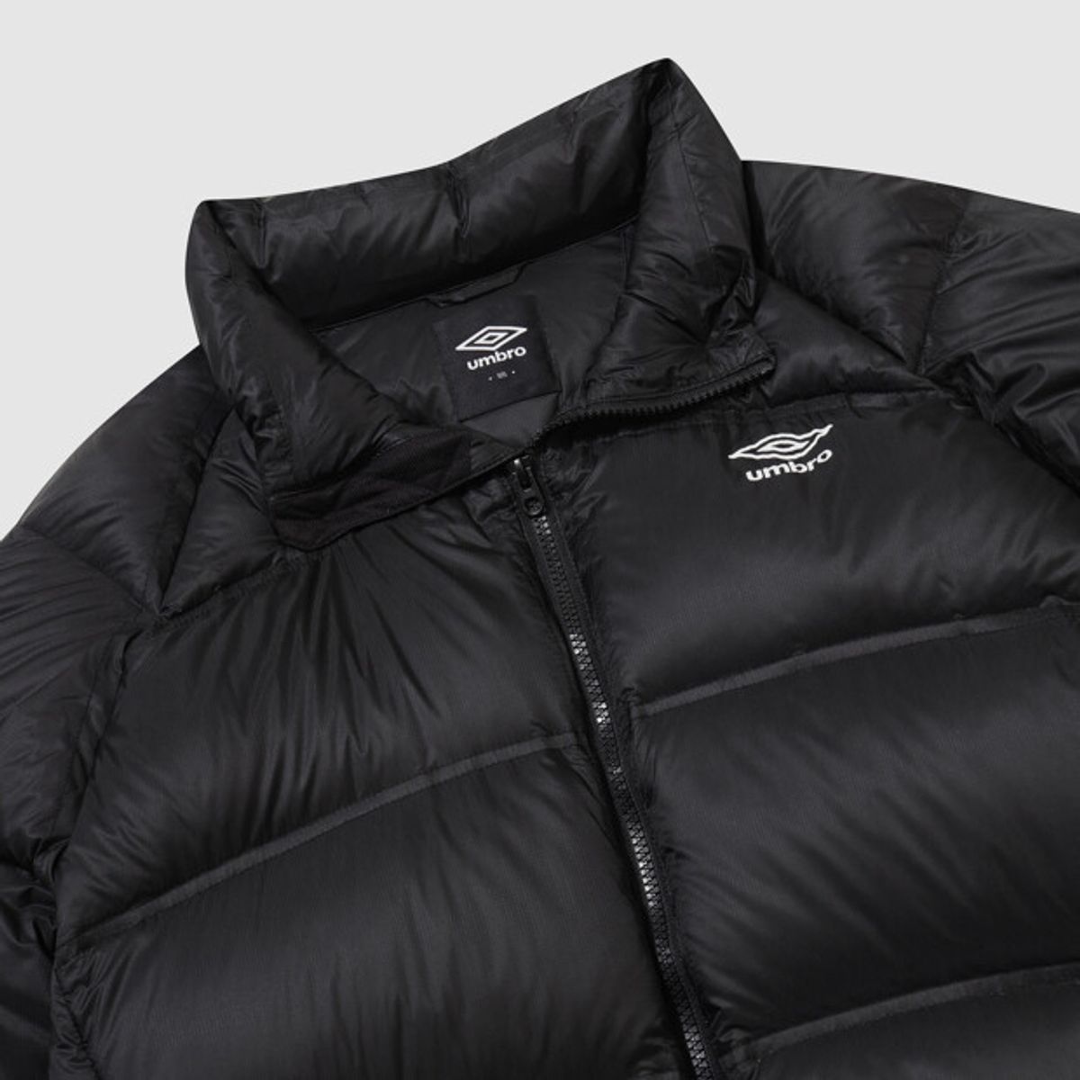 엄브로(UMBRO) 엑스레이 스탠넥 머스코비 덕 다운 자켓 블랙 UR421CDJN4
