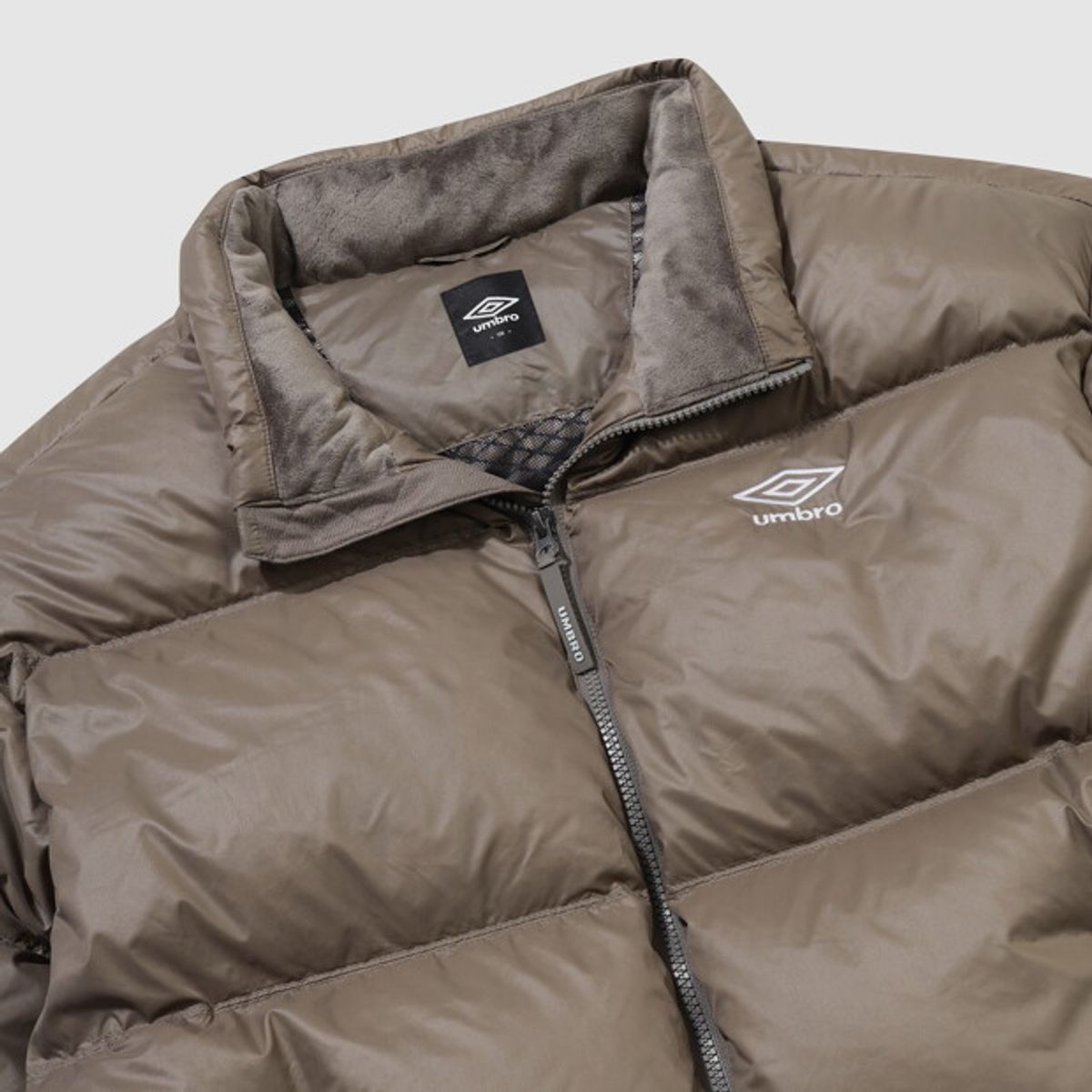 엄브로(UMBRO) 플라이트 숏 머스코비 덕 다운 자켓 브라운 UR421CDJO5