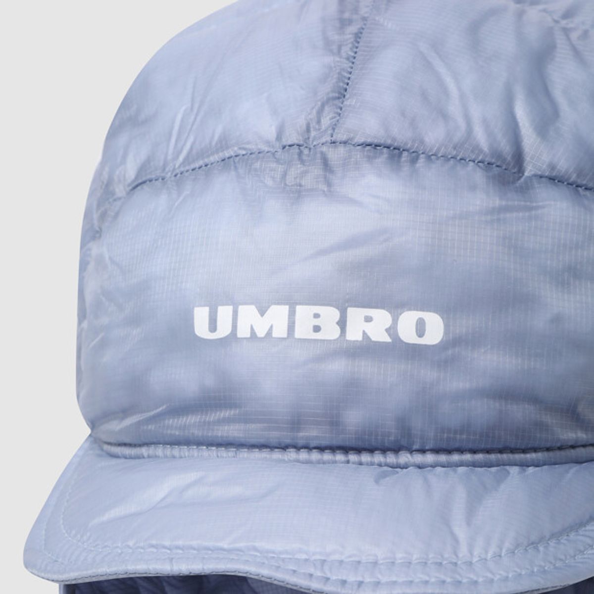 엄브로(UMBRO) 엑스레이 트래퍼 햇 블루 UR423CCPO5