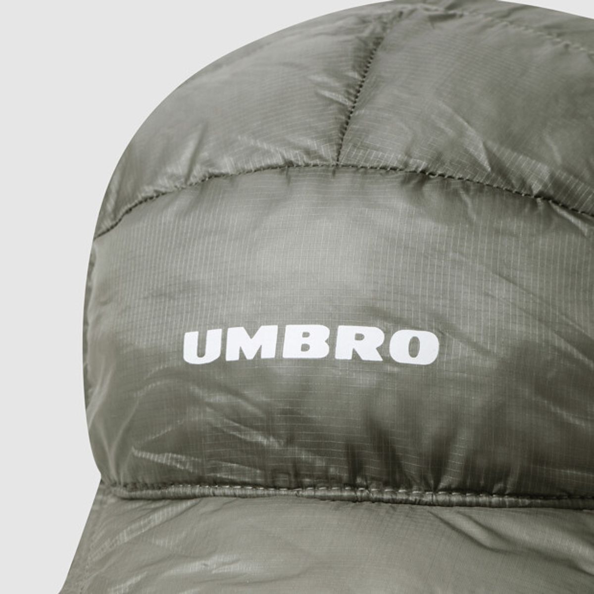 엄브로(UMBRO) 엑스레이 트래퍼 햇 카키 UR423CCPO5