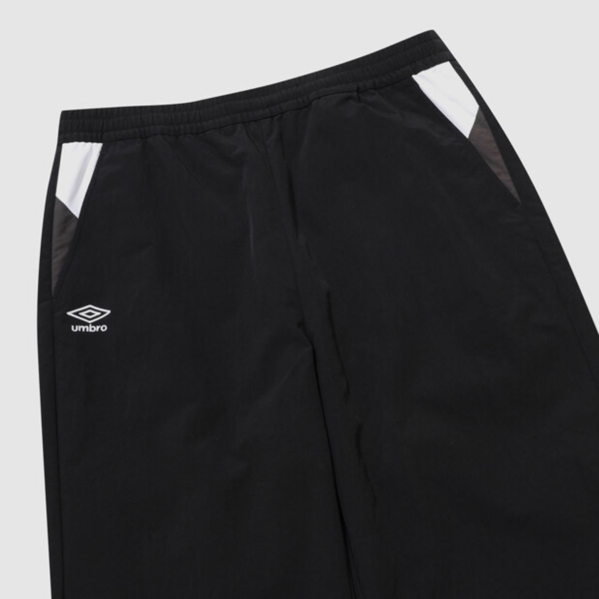 엄브로(UMBRO) 팝러쉬 조거 팬츠 블랙 UR323CPT98