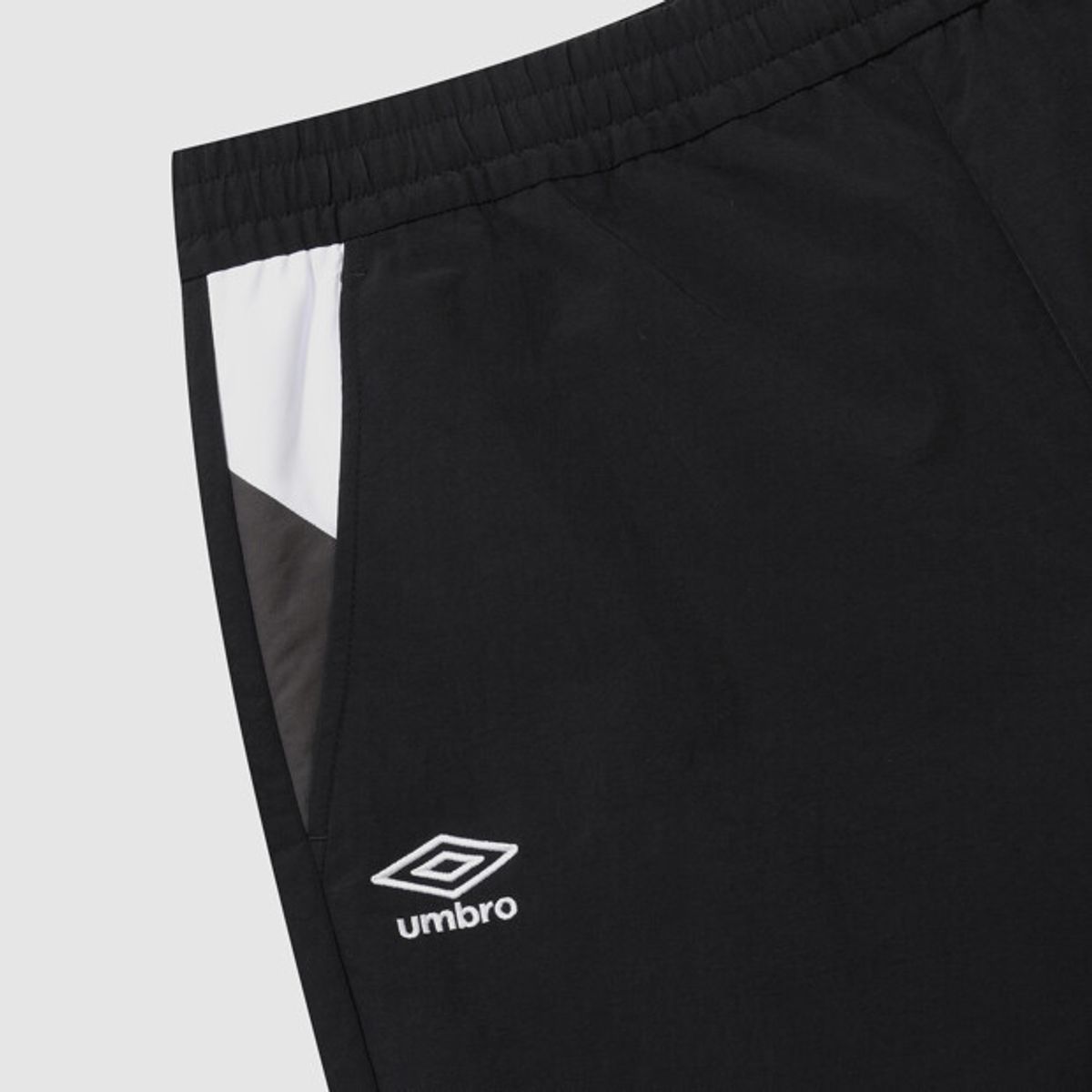 엄브로(UMBRO) 팝러쉬 조거 팬츠 블랙 UR323CPT98