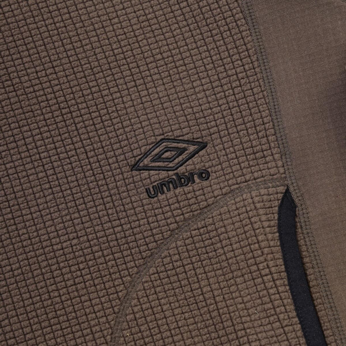 엄브로(UMBRO) 그리드 플리스 쿼터 집업 브라운 UR421CFSO2