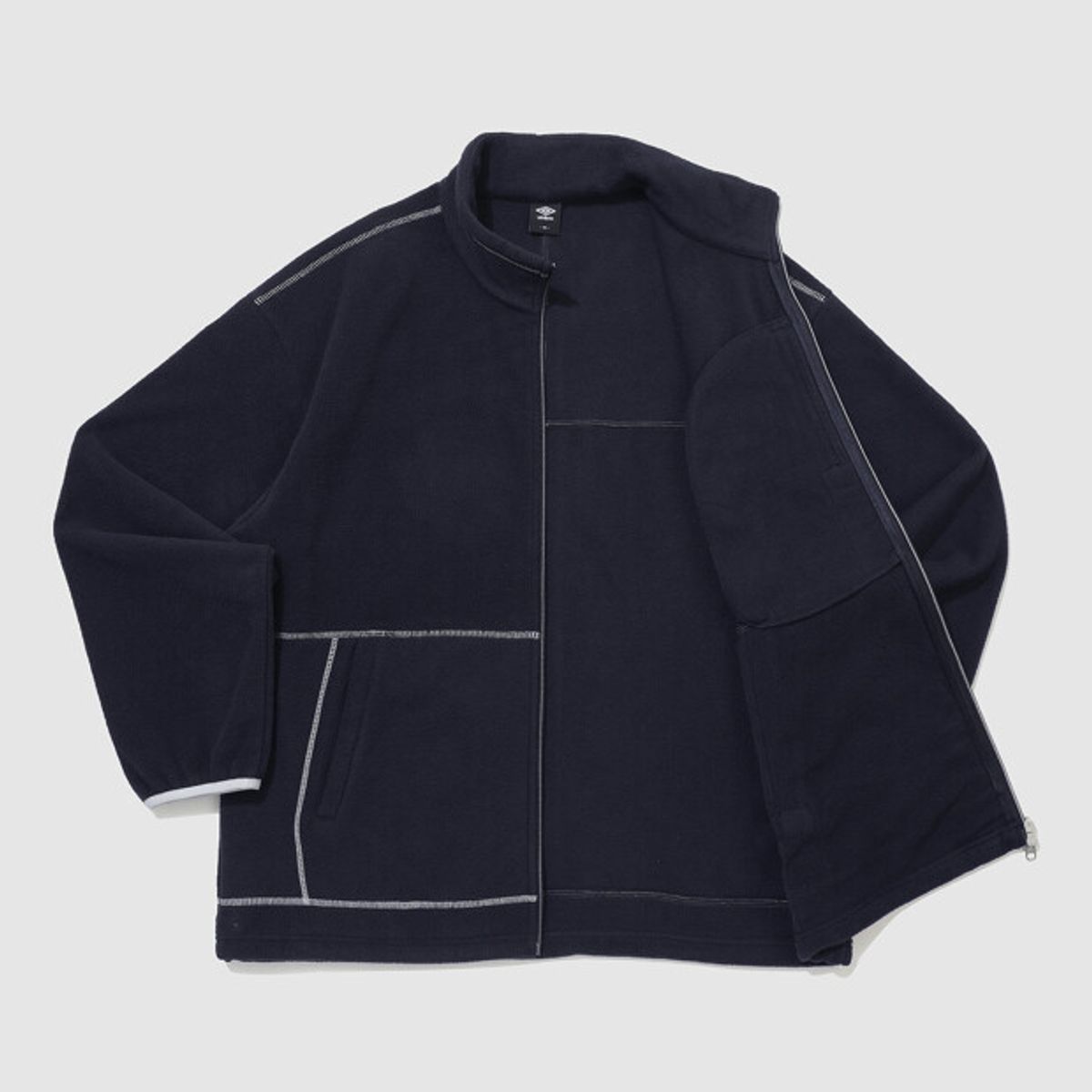엄브로(UMBRO) 크리스피 타슬란 플리스 자켓 네이비 UR324CFJ91