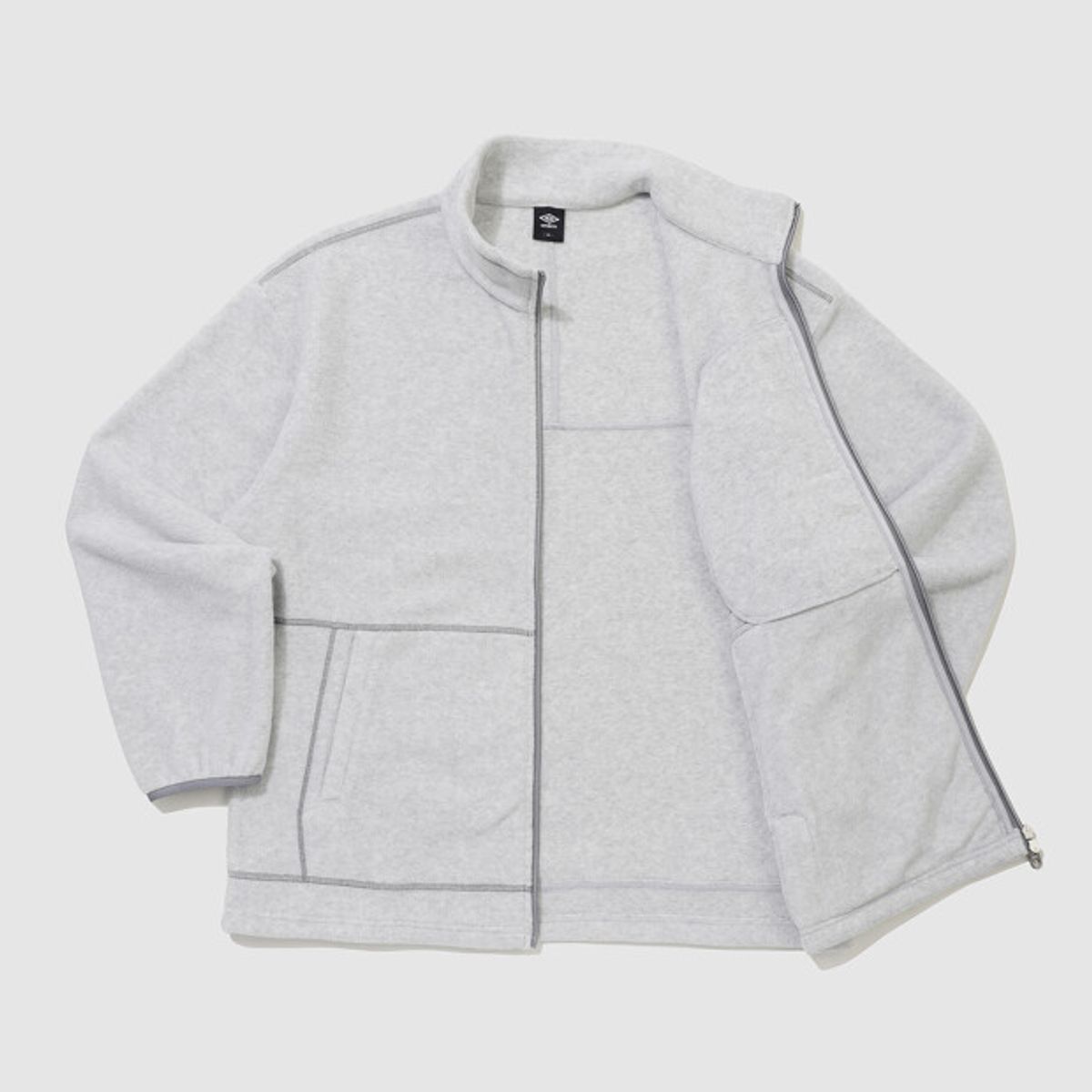 엄브로(UMBRO) 크리스피 타슬란 플리스 자켓 화이트 UR324CFJ91