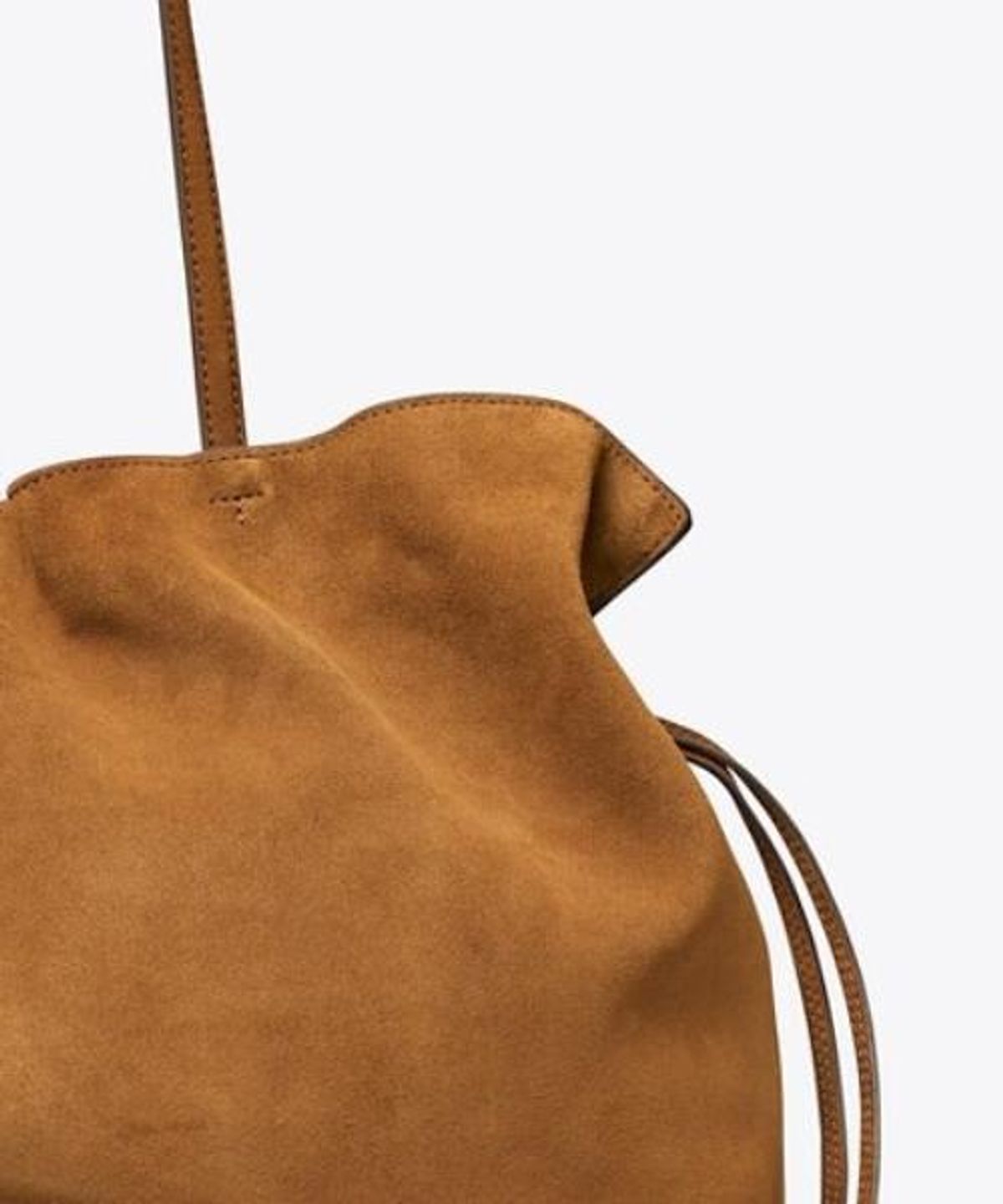 토리버치(TORYBURCH) 엘라 스웨이드 드로스트링 토트 - 카라멜