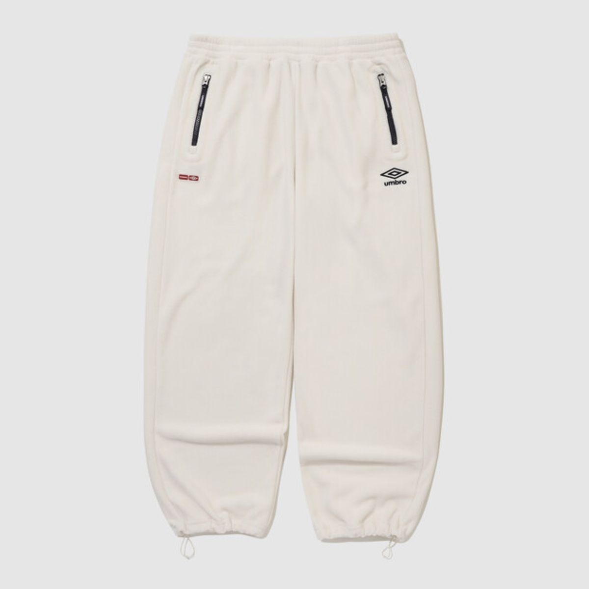 엄브로(UMBRO) 알파플리스 조거&스트레이트 2WAY 팬츠 아이보리 UR423CFPN2