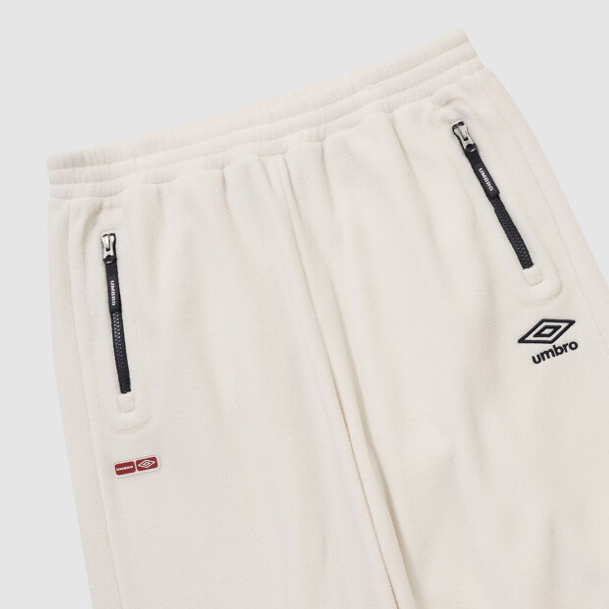 엄브로(UMBRO) 알파플리스 조거&스트레이트 2WAY 팬츠 아이보리 UR423CFPN2