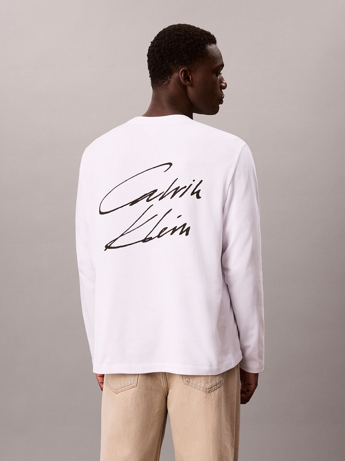 캘빈클라인 진(CALVIN KLEIN JEANS) 릴렉스 300gsm 백 스크립트 그래픽 긴팔 티셔츠 4RJ814G YAF