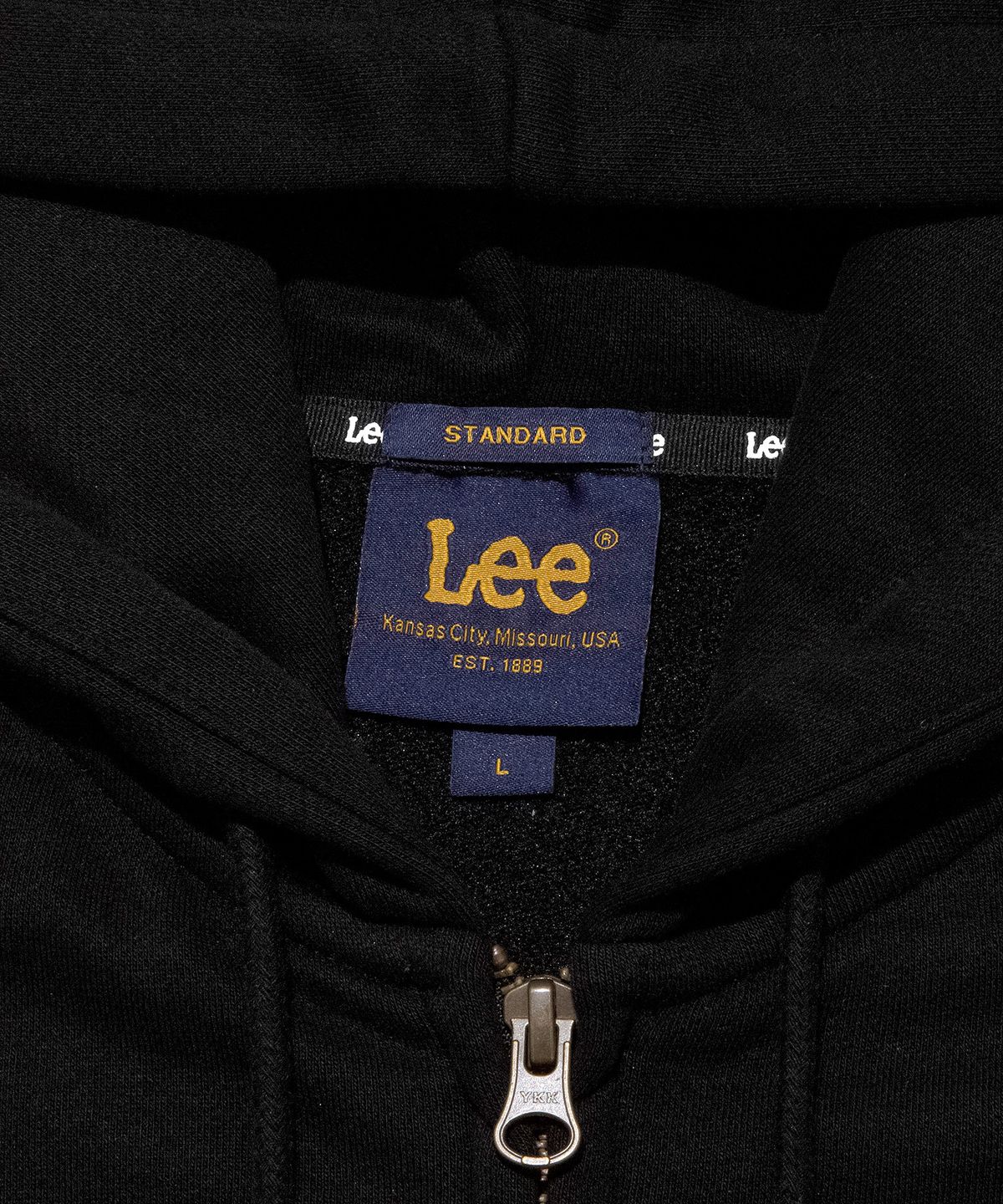 리(LEE) 스몰 트위치 로고 기모 후드 집업 블랙
