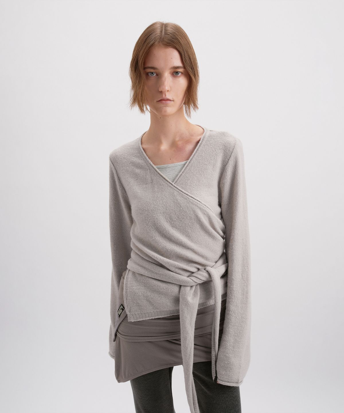 시메트릭 퍼센트(SYMMETRICPERCENT) Envelop Draped Knit / Oat beige