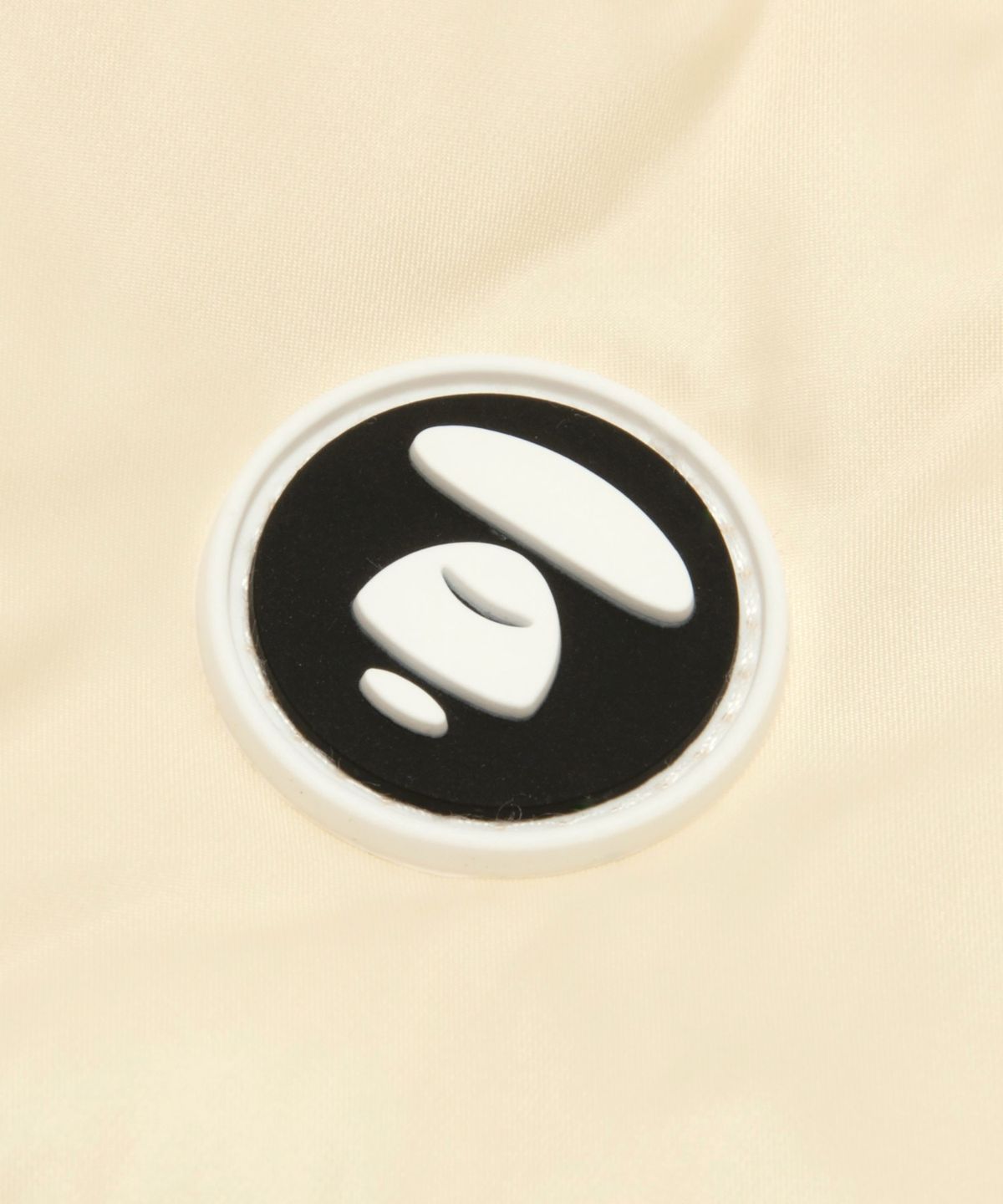 에이프(AAPE) AAPENOW Moonface 다운 재킷 아이보리 / AAPDNM7785XXRIVX
