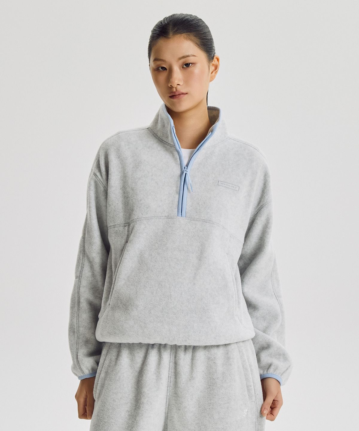 뉴발란스(NEW BALANCE) NBNCG4W912 / WOMEN 코지 플리스 반집업 (L/GRAY)