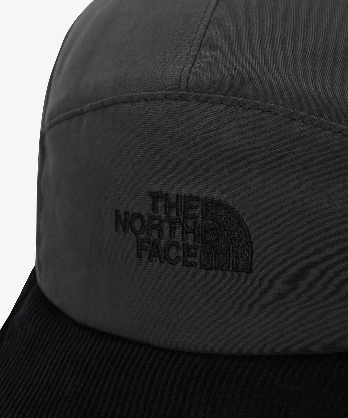 노스페이스(THE NORTH FACE) NE3CS56K 왁스드 코튼 이어머프 캡 DARK CHARCOAL