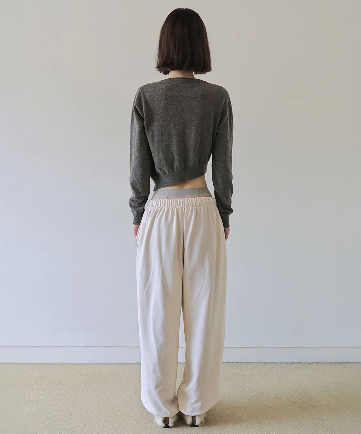 더블유케이엔디 프로젝트(WKND PROJECT) ASYMMETRIC KNIT CARDIGAN (CHARCOAL)