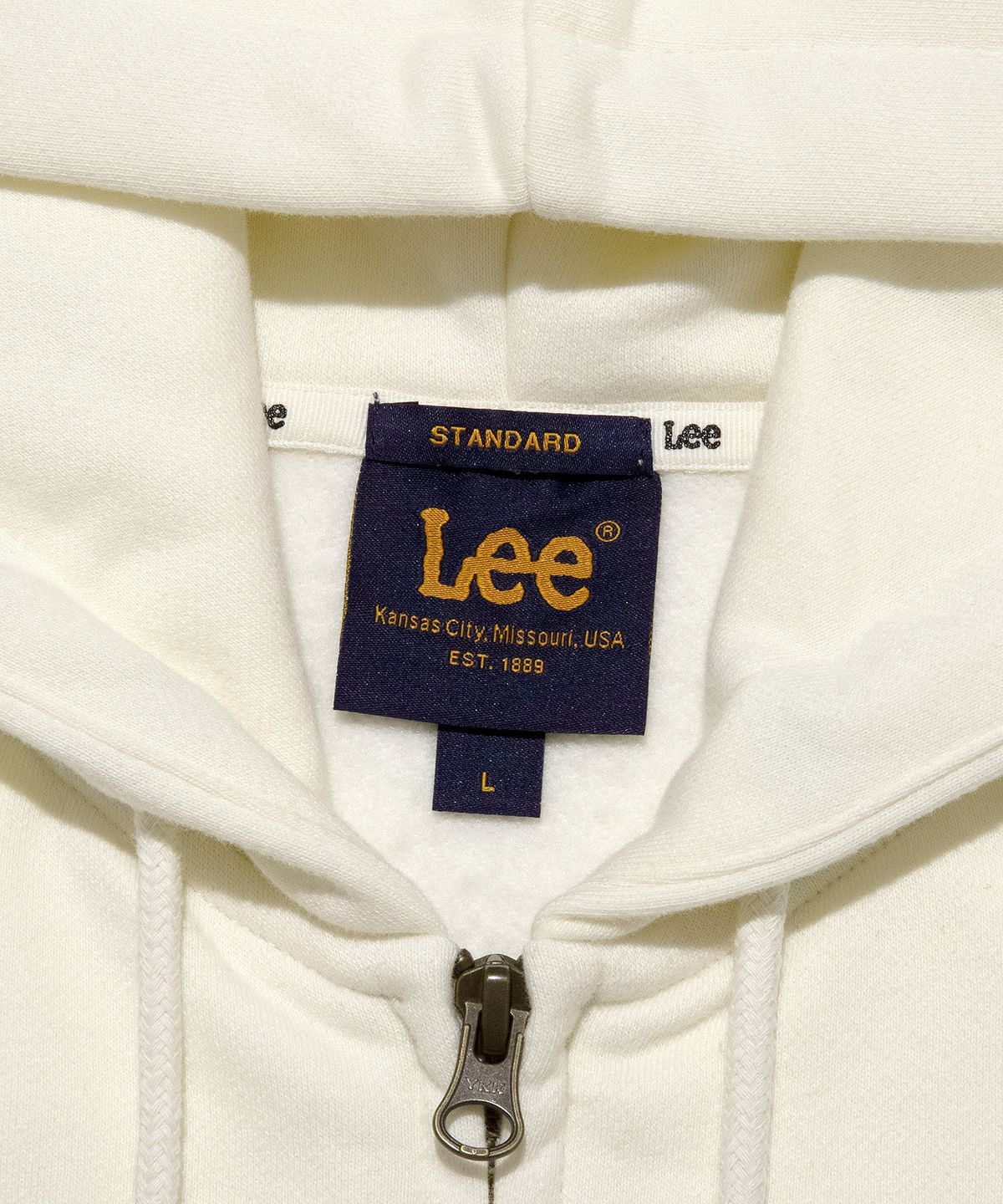 리(LEE) 스몰 트위치 로고 기모 후드 집업 크림