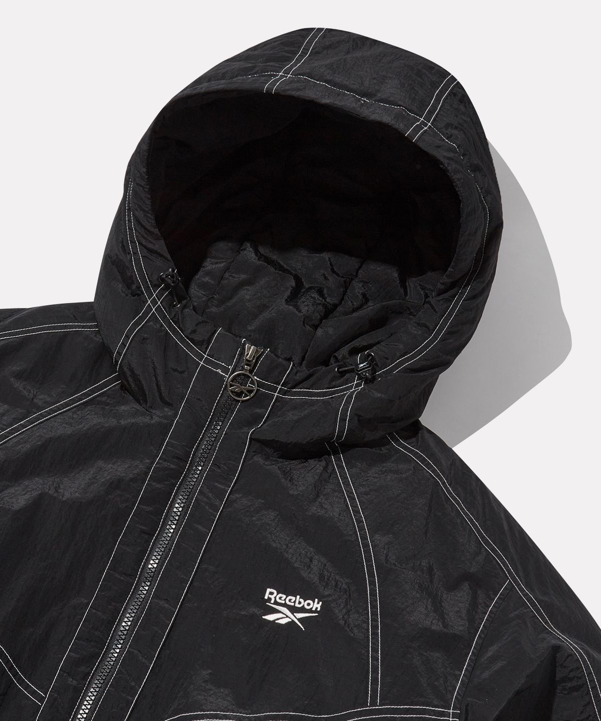리복(REEBOK) 그리드 스티치 패딩 자켓 - 블랙