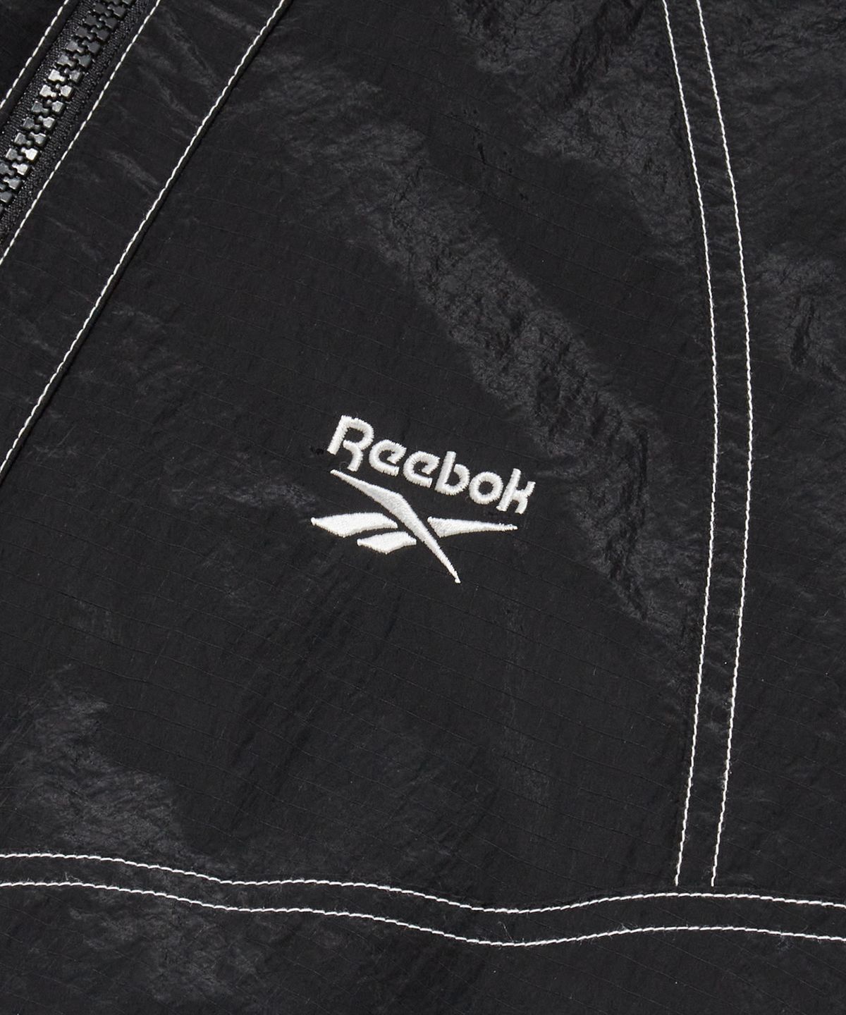 리복(REEBOK) 그리드 스티치 패딩 자켓 - 블랙
