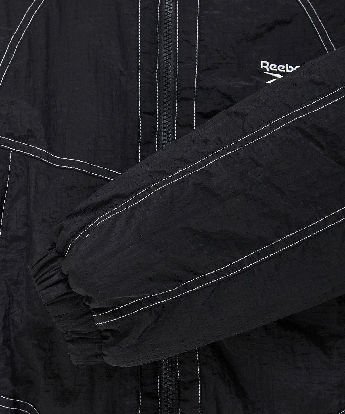 리복(REEBOK) 그리드 스티치 패딩 자켓 (W) - 블랙