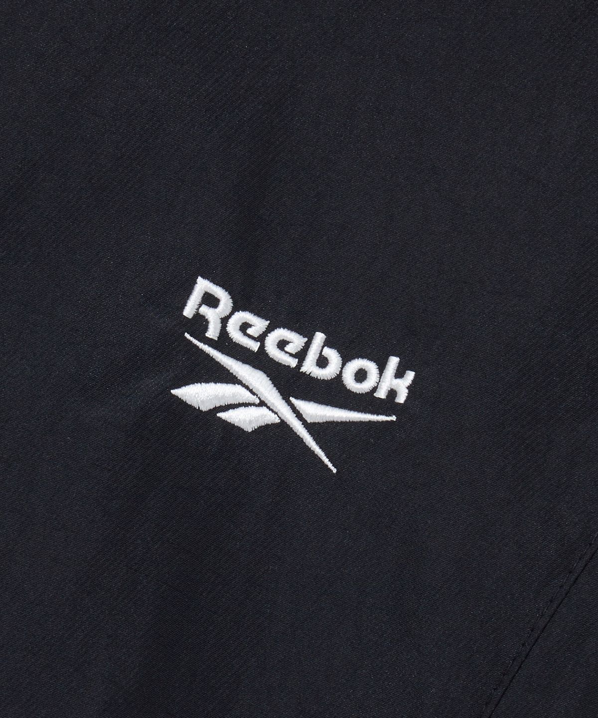 리복(REEBOK) DNA 트랙 패딩 자켓 - 블랙