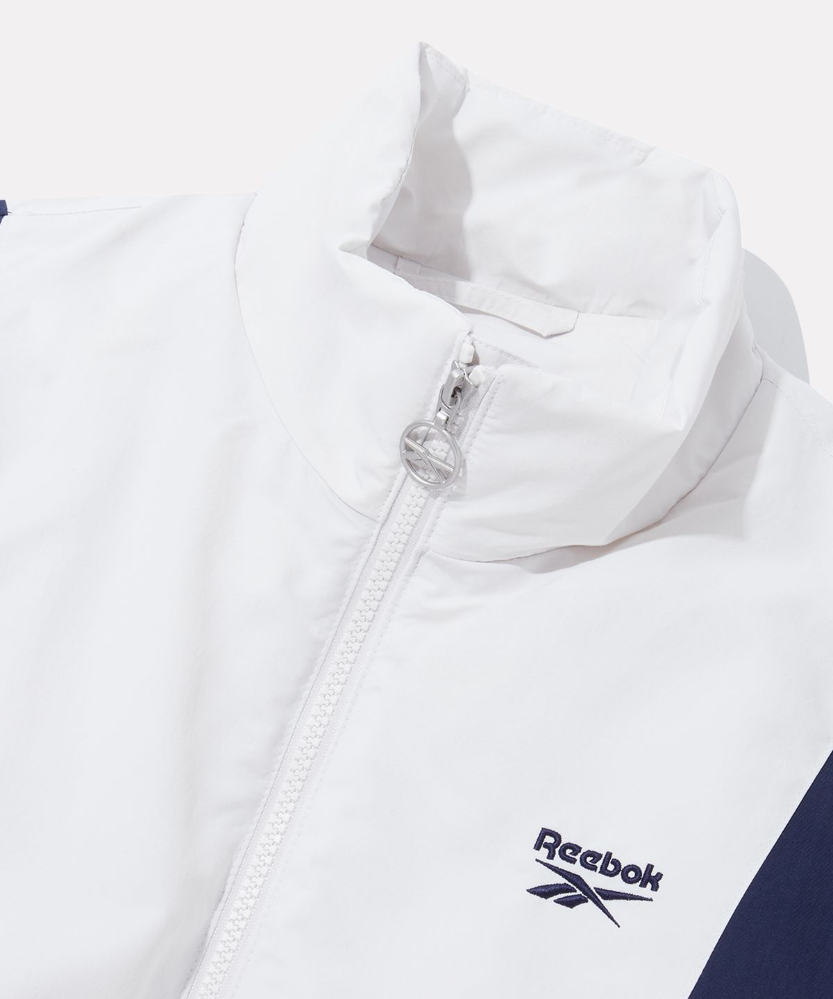 리복(REEBOK) DNA 트랙 패딩 자켓 (W) - 페일 베이지