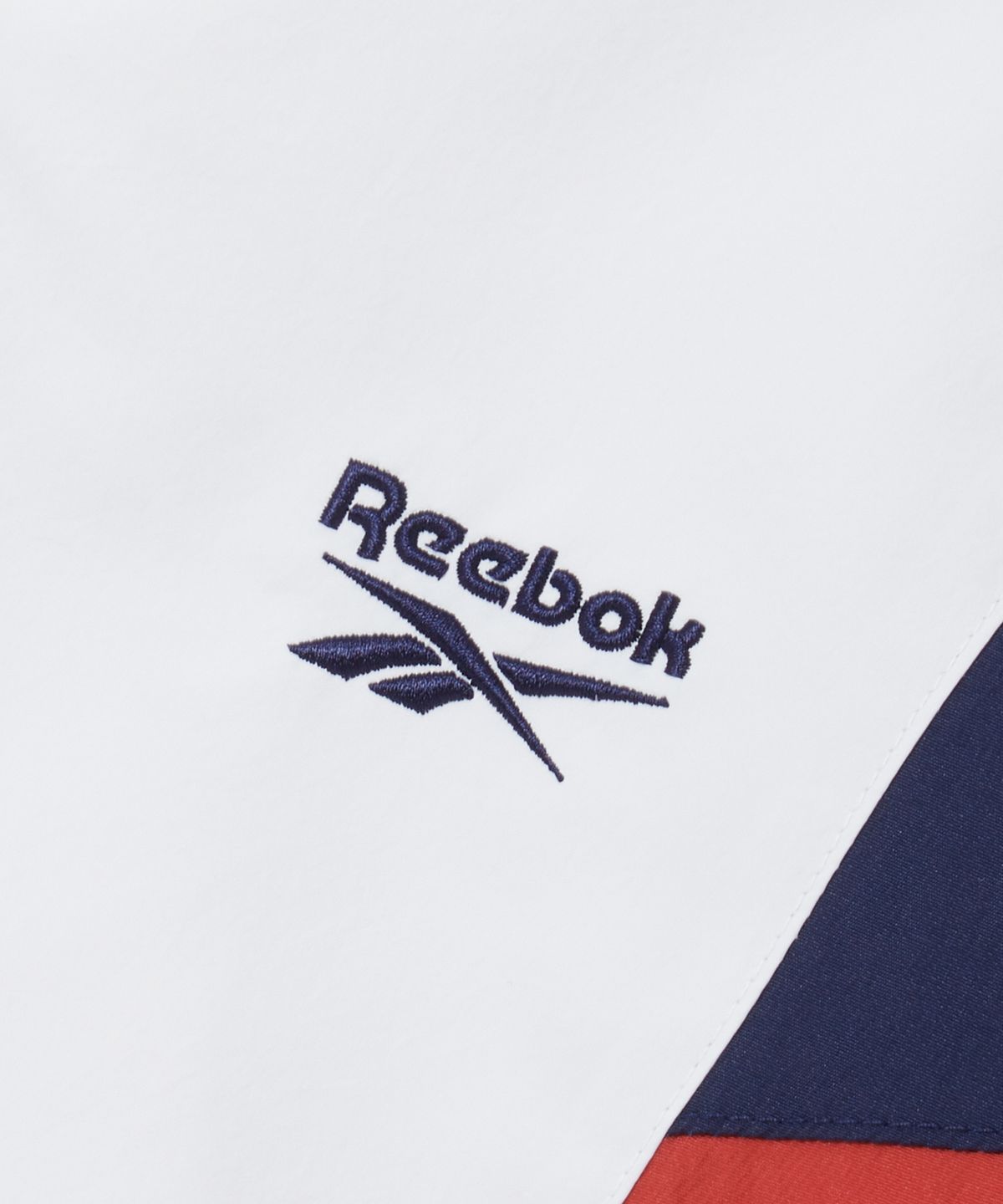 리복(REEBOK) DNA 트랙 패딩 자켓 (W) - 페일 베이지