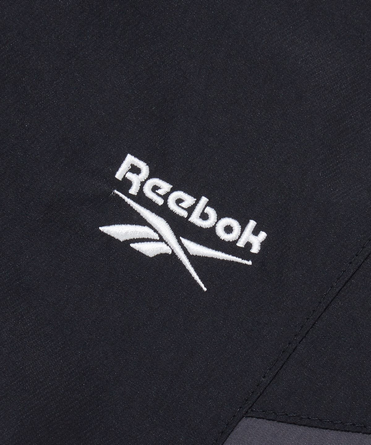 리복(REEBOK) DNA 트랙 패딩 자켓 (W) - 블랙