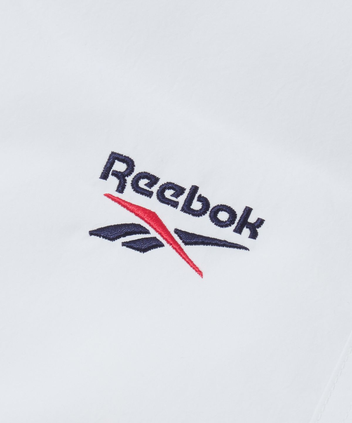 리복(REEBOK) 벡터 리버시블 패딩 - 페일 베이지:그레이