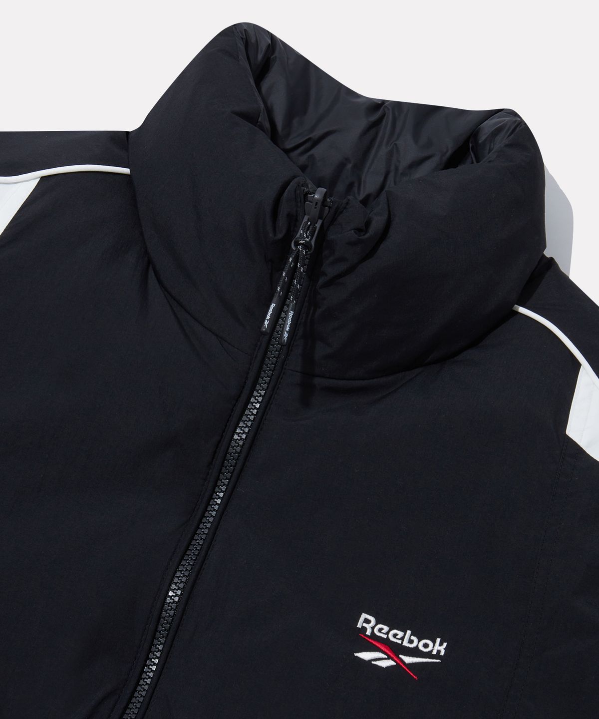리복(REEBOK) 벡터 리버시블 패딩 - 블랙:블랙