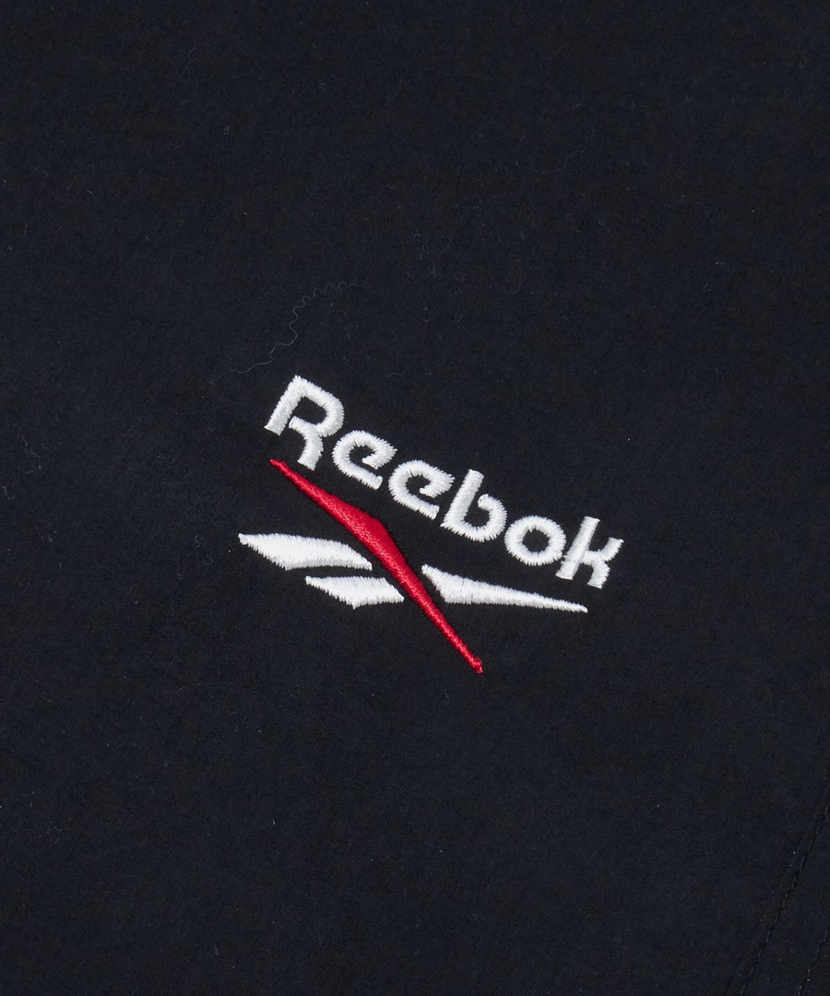 리복(REEBOK) 벡터 리버시블 패딩 - 블랙:블랙