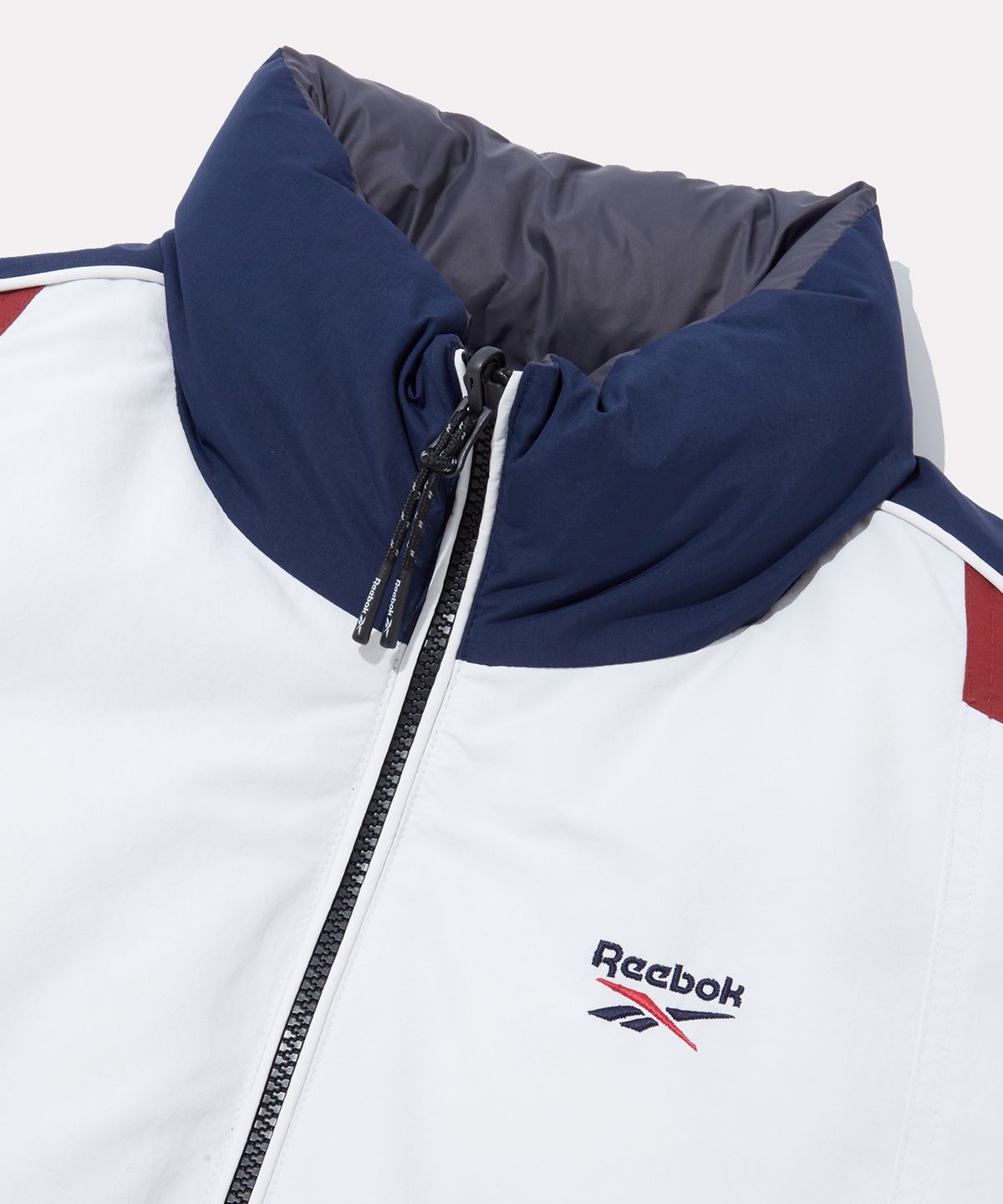 리복(REEBOK) 벡터 리버시블 패딩 (W) - 페일 베이지:그레이