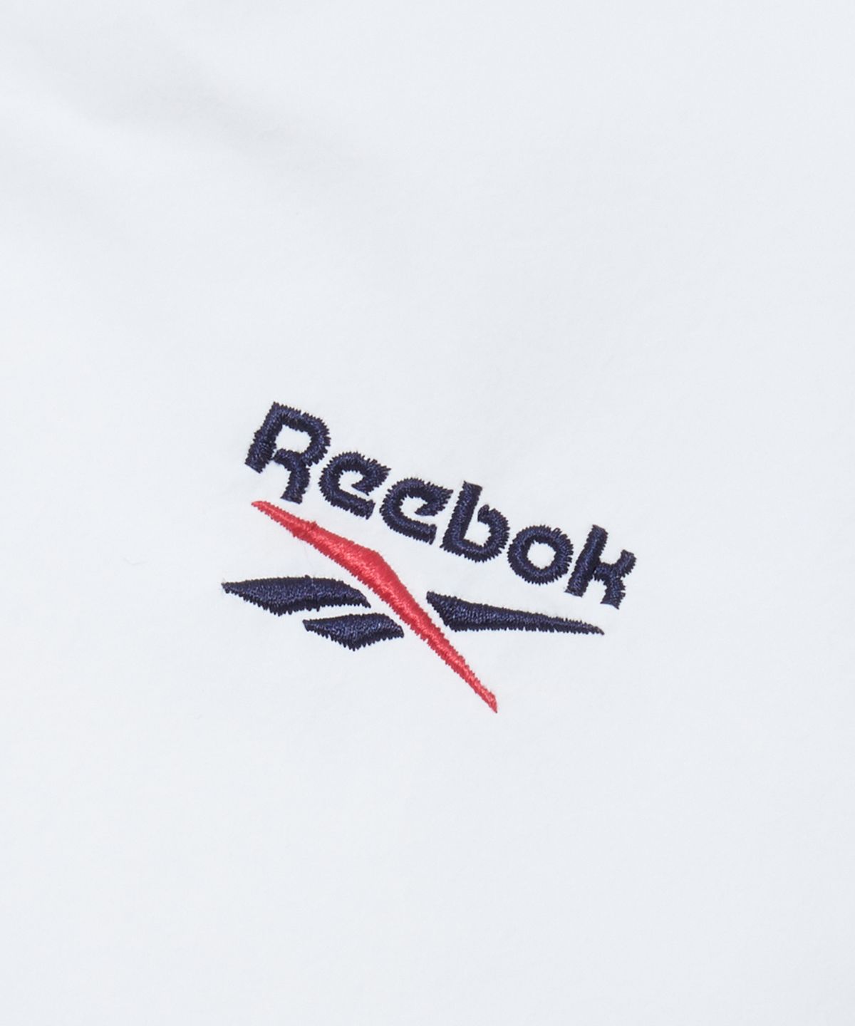 리복(REEBOK) 벡터 리버시블 패딩 (W) - 페일 베이지:그레이