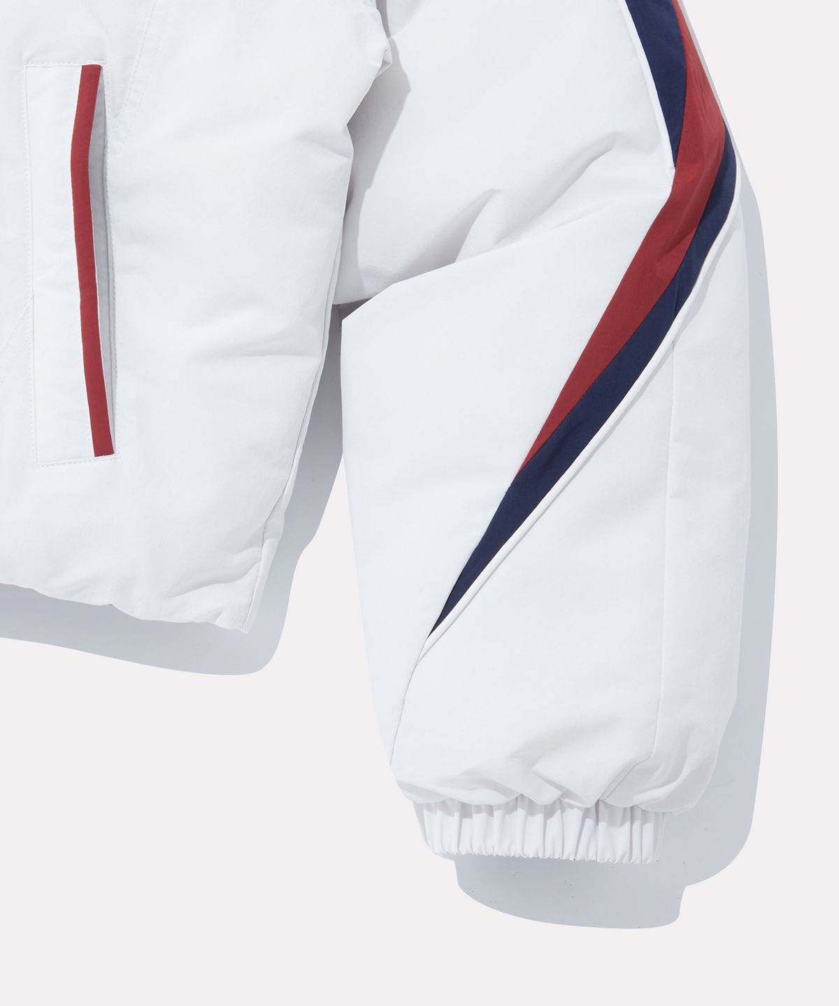 리복(REEBOK) 벡터 리버시블 패딩 (W) - 페일 베이지:그레이