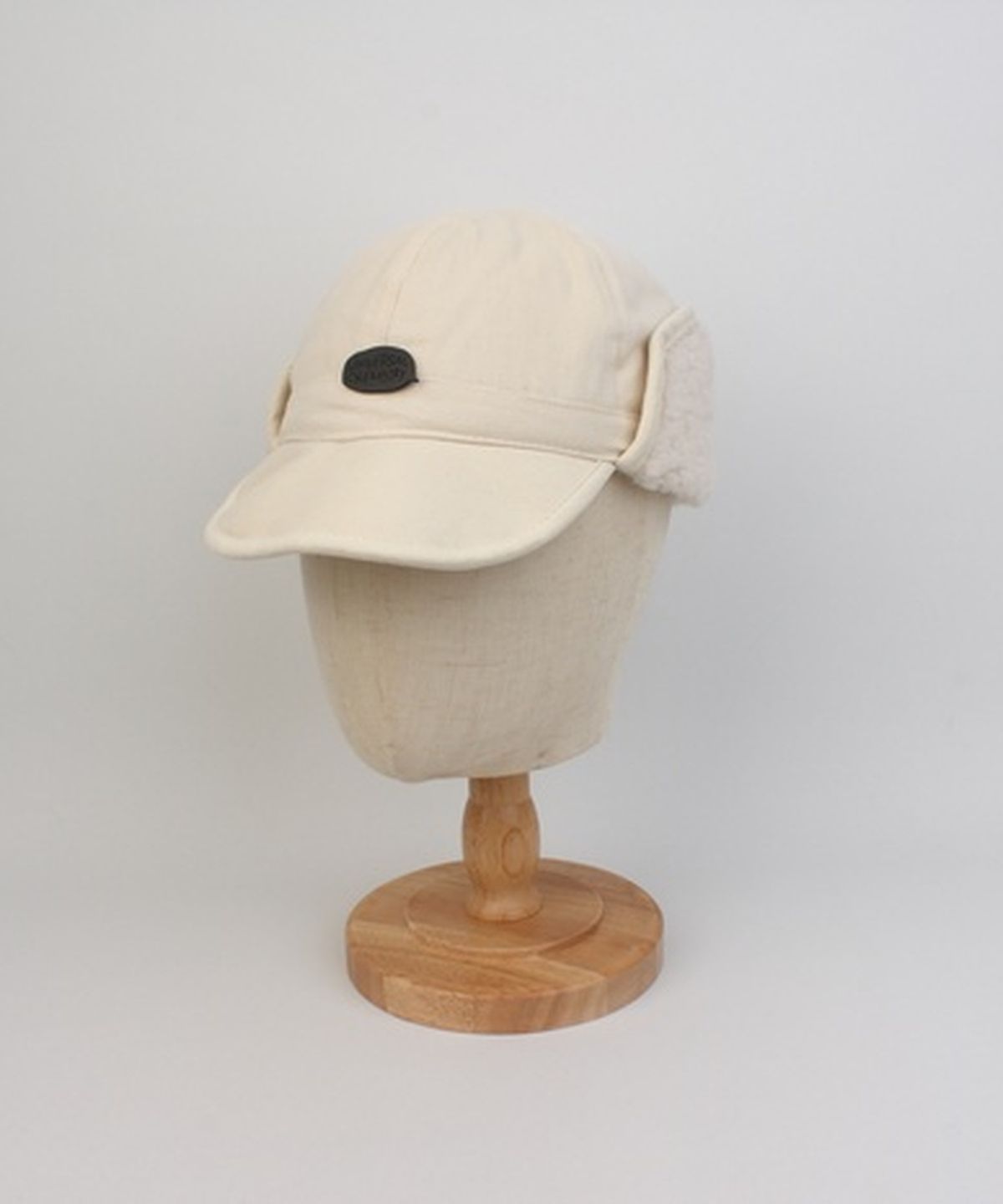 유니버셜 케미스트리(UNIVERSAL CHEMISTRY) Washing Ivory Half Earflap Cap 귀달이모자
