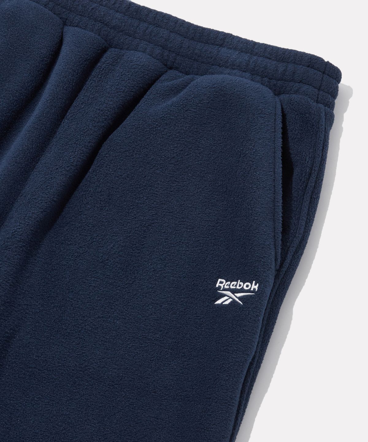 리복(REEBOK) 플리스 와이드 2WAY 팬츠 - 네이비