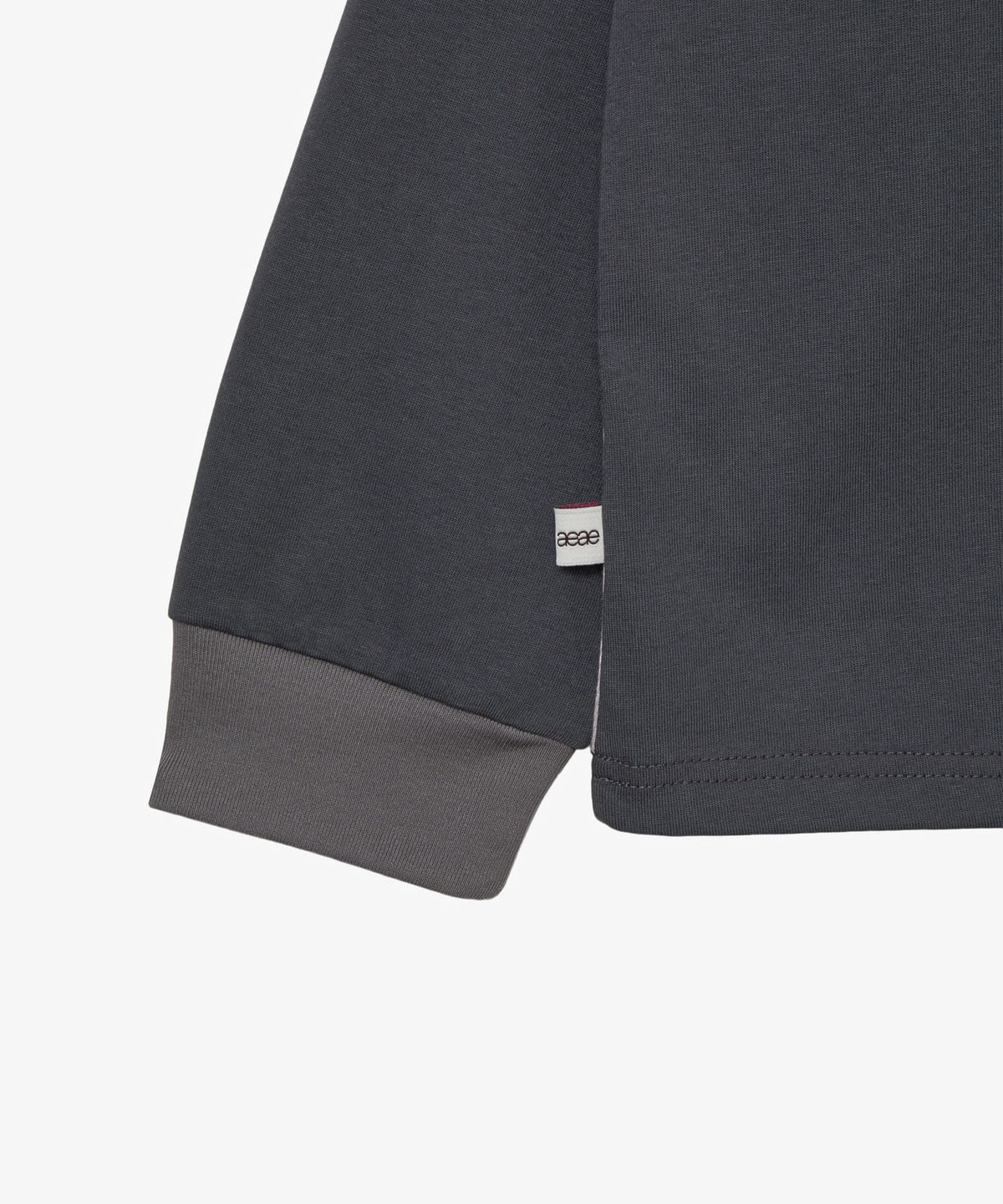에이이에이이(AEAE) HELLO KITTY IN SUBWAY GRAPHIC RAGLAN TEE [CHARCOAL]