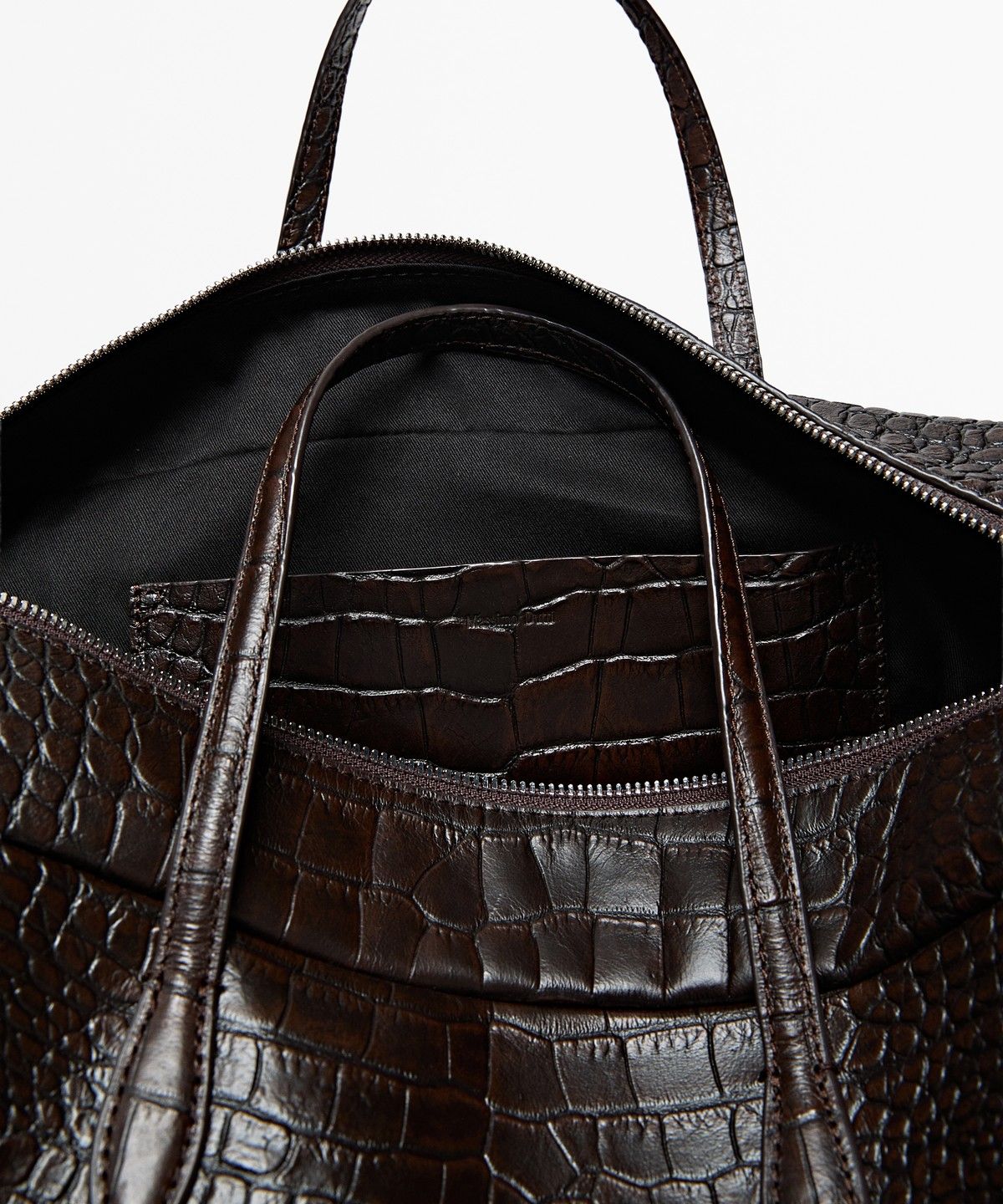 마시모두띠(MASSIMO DUTTI) 텍스처 가죽 더플 백