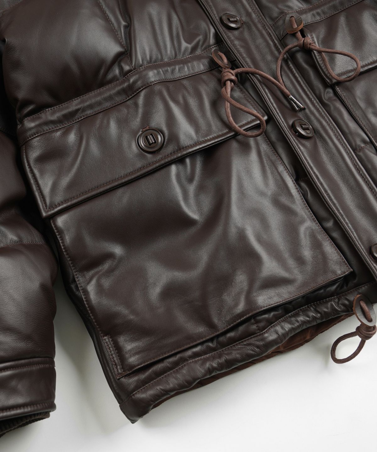프리즘웍스(FRIZMWORKS) LAMBSKIN KARAKORAM GOOSE DOWN PARKA _ BROWN
