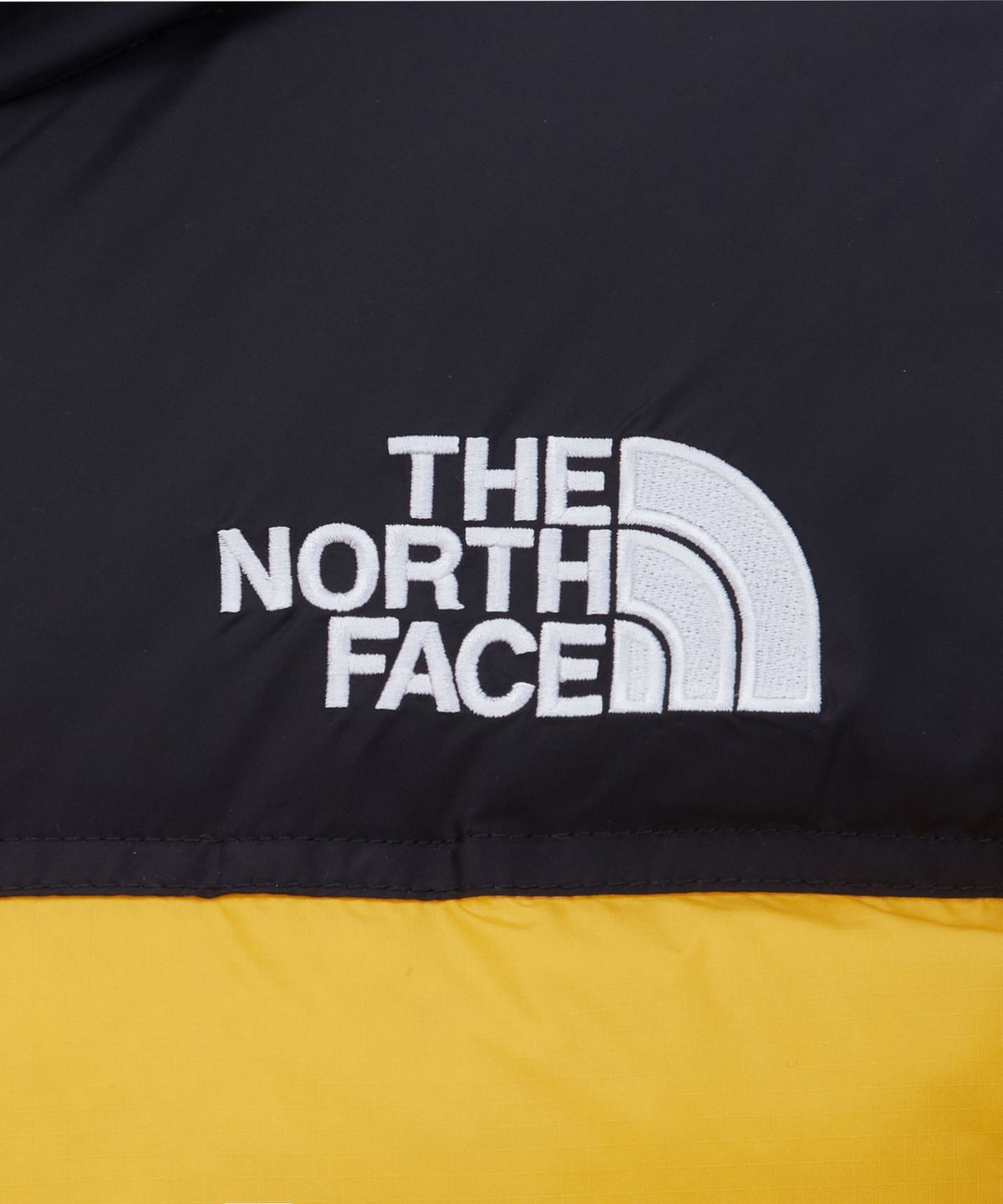 노스페이스(THE NORTH FACE) NJ1DS75G 남성 1996 레트로 눕시 다운 자켓 YELLOW