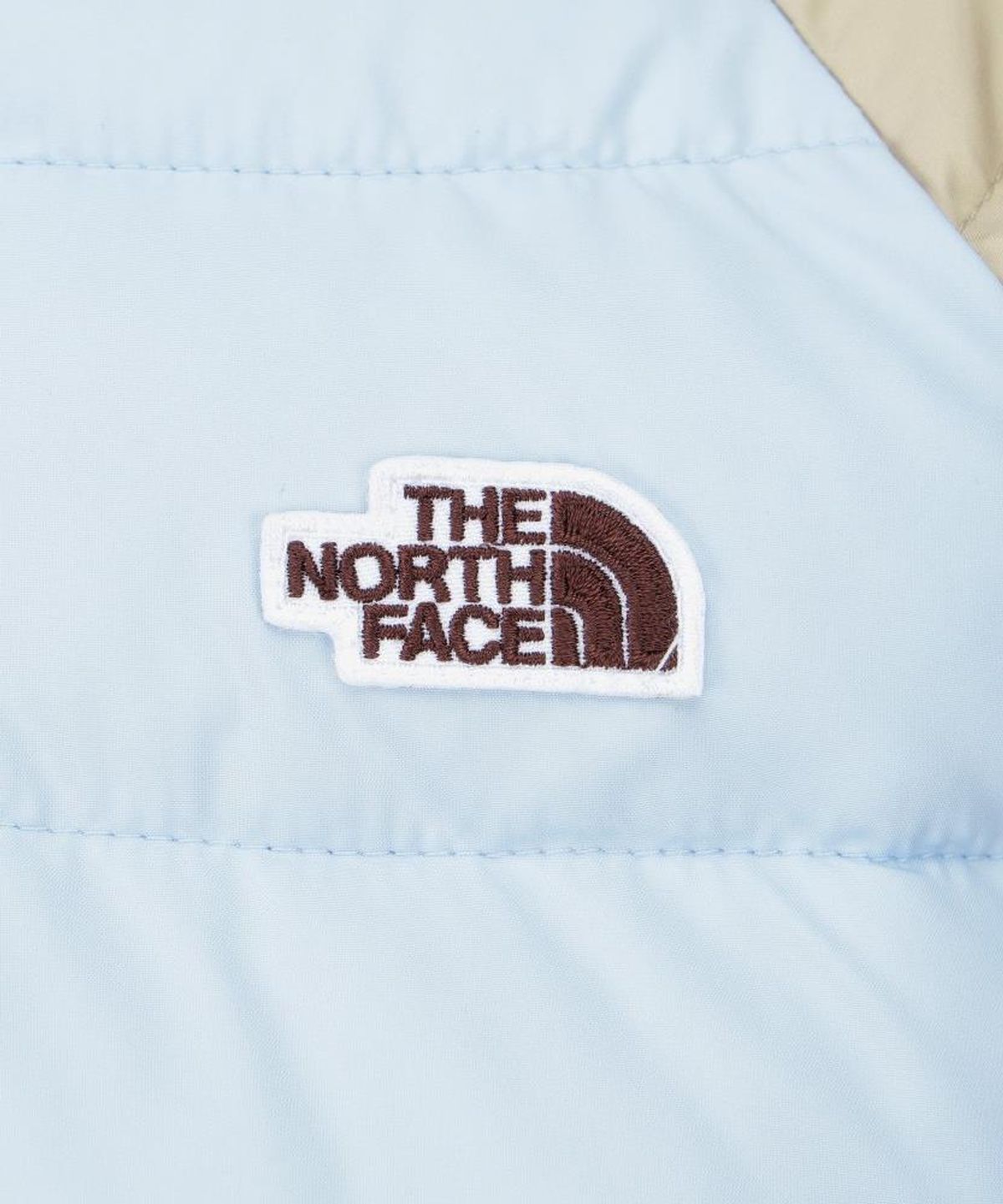 노스페이스 키즈(THE NORTH FACE KIDS) 키즈 올리 티볼 패딩 자켓 NJ3NS54T_BEI