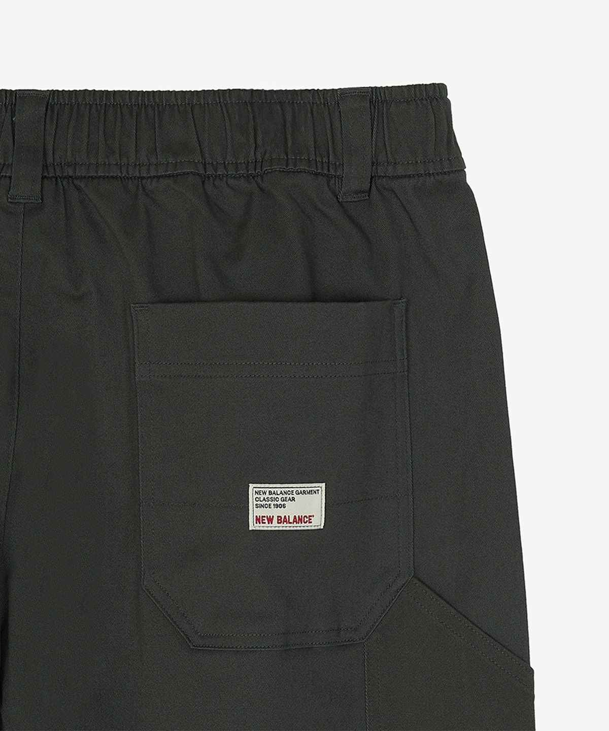 뉴발란스(NEW BALANCE) NBNTG41053 / UNI NB GREY 커브드 우븐 와이드 팬츠 (D/KHAKI)