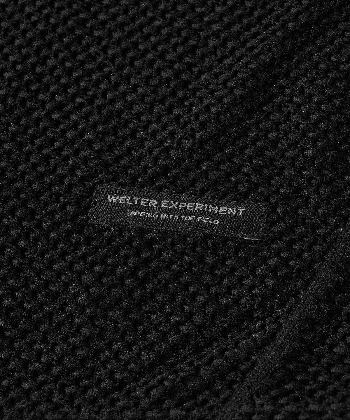 웰터 익스페리먼트(WELTER EXPERIMENT) 카이론 옥타 긴팔 티셔츠 블랙
