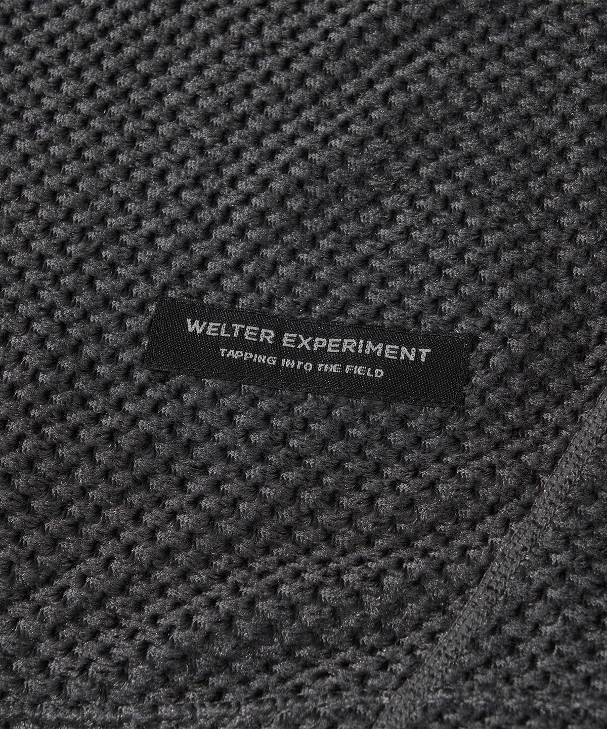 웰터 익스페리먼트(WELTER EXPERIMENT) 카이론 옥타 긴팔 티셔츠 차콜